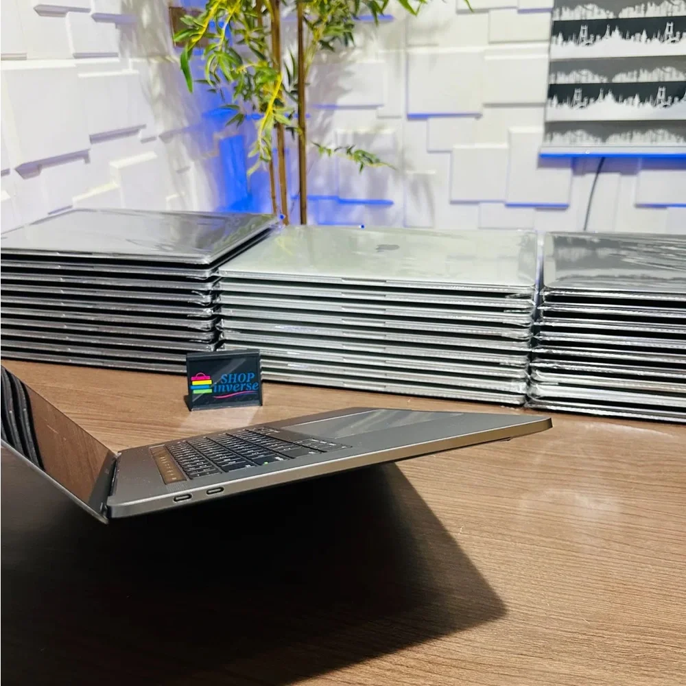 Apple MacBook with Silver Body and Black Keyboard